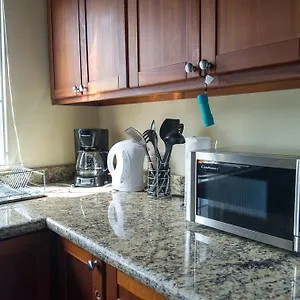 Claude Clarke Suites Apartment
